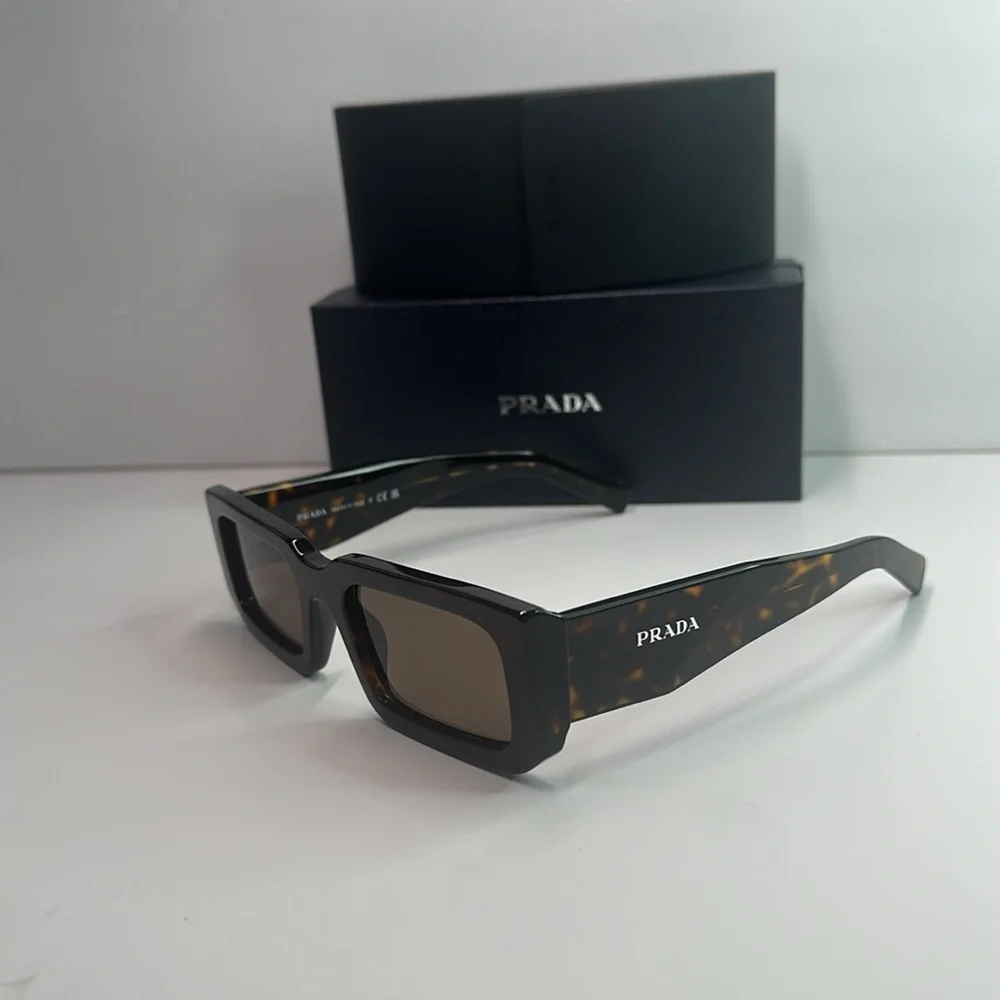 Prada PR06YS Brown Sunglasses with Bold Frames and UV Protection